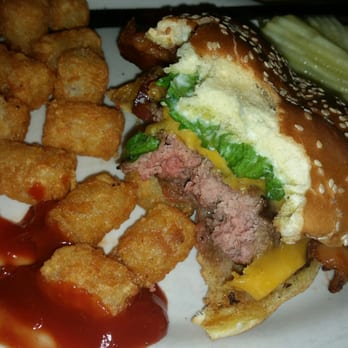 Vortex Bar & Grill - Half eaten cheeseburger - American Near Me - Atlanta, Georgia Vortex Bar & Grill - Half eaten cheeseburger - American Near Me - Atlanta, Georgia