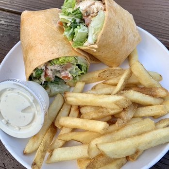 Funky Pelican - Chicken Caesar wrap.  Side of ranch provided on our request for the fries. - Seafood Near Me - Flagler Beach, Florida
