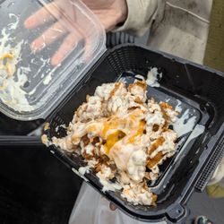 Ali’s Hot Chicken & Smash Burger - Ordered $14 Blooming Onion and got this after 30 min. They wouldn't take it back. Threw it in the garbage.