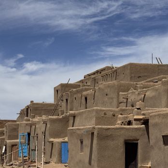 Taos Pueblo - Beautiful Taos Pueblo with blue doors and blue skies - Landmarks & Historical Buildings Near Me - Taos, New Mexico