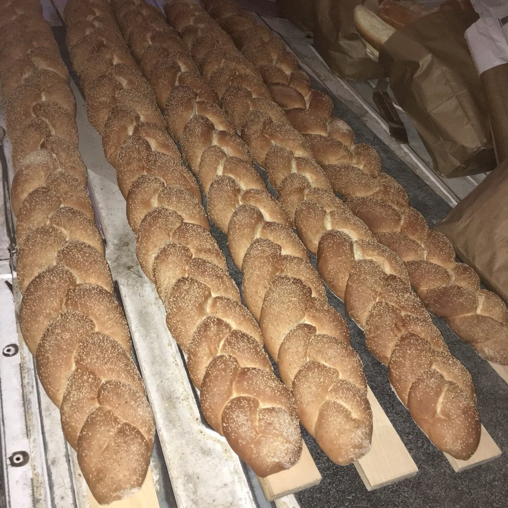 A & L Bakery - bread rolls on a conveyor belt - Bakeries Near Me - Boston, Massachusetts A & L Bakery - bread rolls on a conveyor belt - Bakeries Near Me - Boston, Massachusetts