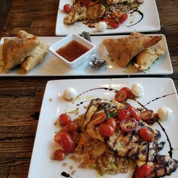 STIR - Chicken caprese (tomatoes, and mozzarella, with roasted farro and veg, and a bit of balsamic) samosa app (with spicy thai sauce) - Bars Near Me - Raleigh, North Carolina