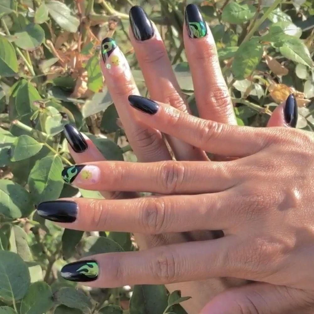 BB Nails - spooky set with skull + flame accent nails! - Nail Technicians Near Me