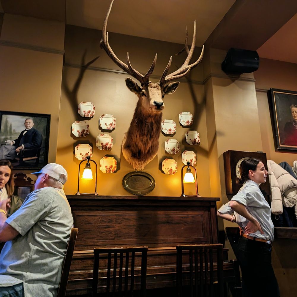 The Crunkleton - Inside. Cool decor. Old portraits and hunting trophies. Host/hostess stand to right. - Cocktail Bars Near Me - Chapel Hill, North Carolina The Crunkleton - Inside. Cool decor. Old portraits and hunting trophies. Host/hostess stand to right. - Cocktail Bars Near Me - Chapel Hill, North Carolina