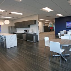 Vertical Interior Design - Break room, kitchen, cafeteria for employees.