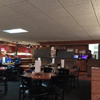 Pizza Hut - people sitting at tables in a restaurant - Pizza Near Me - Wa Keeney, Kansas Pizza Hut - people sitting at tables in a restaurant - Pizza Near Me - Wa Keeney, Kansas