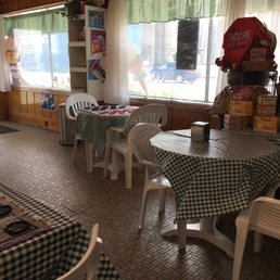 Tables, some with checkers to play.
