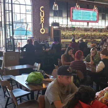 The Denver Central Market - Curio bar and dining area in the middle - Bakeries Near Me - Denver, Colorado The Denver Central Market - Curio bar and dining area in the middle - Bakeries Near Me - Denver, Colorado