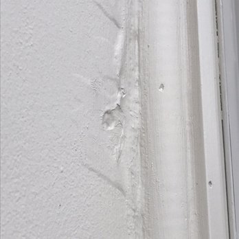 Hastings Painting & Decorating - Caulking used to tack down loose paint. - Painters Near Me - Evanston, Illinois