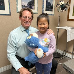 Mark Reed, DPM DABFAS - Dr. Reed with a patient