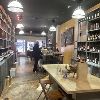Wolfe's Wine Shoppe - a man standing at the counter - Beer, Wine & Spirits Near Me - Coral Gables, Florida Wolfe's Wine Shoppe - a man standing at the counter - Beer, Wine & Spirits Near Me - Coral Gables, Florida