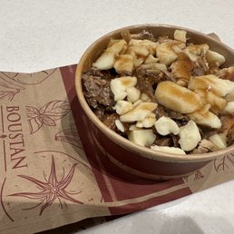 a bowl of oatmeal with banana slices