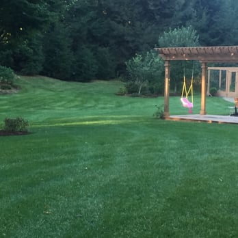 Lawn Dawg - a swing set in a backyard - Lawn Services Near Me - Litchfield, New Hampshire Lawn Dawg - a swing set in a backyard - Lawn Services Near Me - Litchfield, New Hampshire