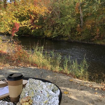 White Mountain Cafe - a table with a cup of coffee and a sandwich on it - Coffee & Tea Near Me - Gorham, New Hampshire White Mountain Cafe - a table with a cup of coffee and a sandwich on it - Coffee & Tea Near Me - Gorham, New Hampshire