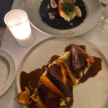 Brasserie 701 - Seared duck breast and lobster squid ink risotto - Brasseries Near Me - Montreal, Quebec Brasserie 701 - Seared duck breast and lobster squid ink risotto - Brasseries Near Me - Montreal, Quebec