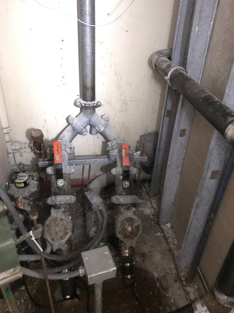 Slide of Mekons Plumbing & Heating Services