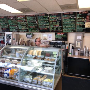 Weaver Construction - a man behind the counter of a restaurant - General Contractors Near Me