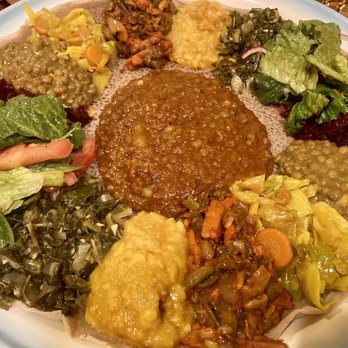 Adey Abeba Ethiopian Restaurant - Two orders veggie combo- arrived on one plate - Ethiopian Near Me - Seattle, Washington Adey Abeba Ethiopian Restaurant - Two orders veggie combo- arrived on one plate - Ethiopian Near Me - Seattle, Washington