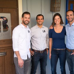 Glen McDowell Photography - Photo is cut off by yelp's square size. Very well balanced with company logos and signs with team.