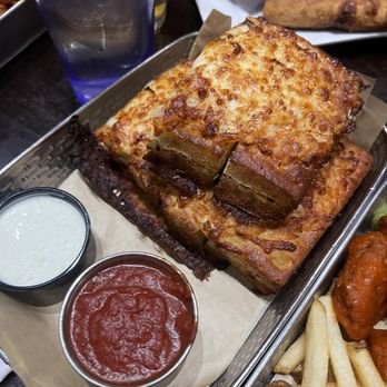 Main Event Avondale - BAKED CHEESY BREADSTICKS - Arcades Near Me - Avondale, Arizona Main Event Avondale - BAKED CHEESY BREADSTICKS - Arcades Near Me - Avondale, Arizona
