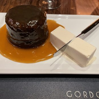 Gordon Ramsay Steak - Sticky toffee pudding with brown butter ice cream in the shape of a stick of butter! - Steakhouses Near Me - North Kansas City, Missouri Gordon Ramsay Steak - Sticky toffee pudding with brown butter ice cream in the shape of a stick of butter! - Steakhouses Near Me - North Kansas City, Missouri