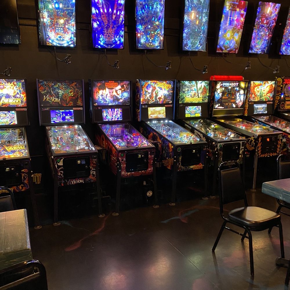 Player 1 Arcade - a row of pinball machines - Arcades Near Me - Surprise, Arizona Player 1 Arcade - a row of pinball machines - Arcades Near Me - Surprise, Arizona