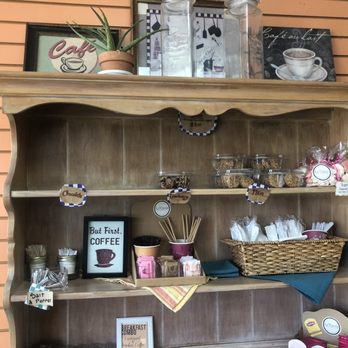 Le Vinois Bakery - a shelf with various items on it - Bakeries Near Me - Fort Lauderdale, Florida