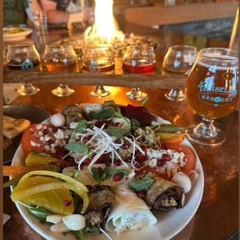 Perihelion Brewery - Goni Plate, beer flight and fire place - Burgers Near Me - Seattle, Washington
