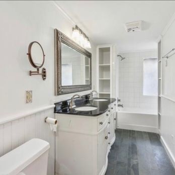 ACM Development - a bathroom with a sink, toilet, and bathtub - General Contractors Near Me ACM Development - a bathroom with a sink, toilet, and bathtub - General Contractors Near Me