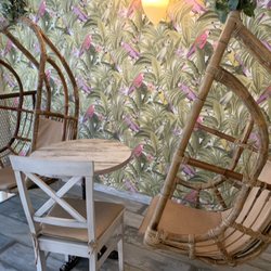 Casa Do Açai - Upstairs seating area has swing chairs