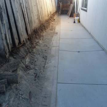 Bolt Masonry - Before. We had a shared property line that was in terrible shape. Over the years people had slapped new fence onto rotted fence. - General Contractors Near Me - San Diego, California Bolt Masonry - Before. We had a shared property line that was in terrible shape. Over the years people had slapped new fence onto rotted fence. - General Contractors Near Me - San Diego, California