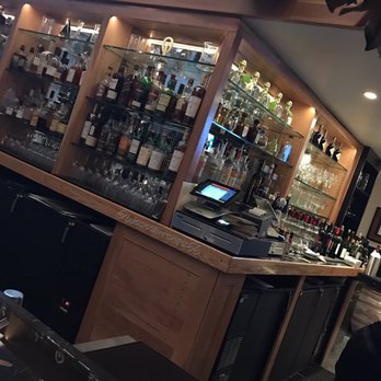 Lefkes - L-shaped bar w/ 2 large TVs - Mediterranean Near Me - Englewood Cliffs, New Jersey Lefkes - L-shaped bar w/ 2 large TVs - Mediterranean Near Me - Englewood Cliffs, New Jersey