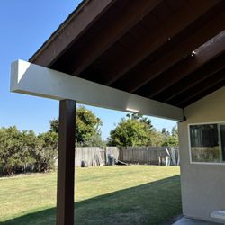Fallon Fix-It Construction & Remodel - Large patio beam replacement. Previous had extensive termite damage. This is primed, we finished with paint and beveled beam end.
