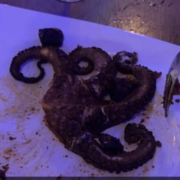 Disgusting octopus my wife ordered from the "under the sea" restaurant. All the restaurants suck in my opinion.