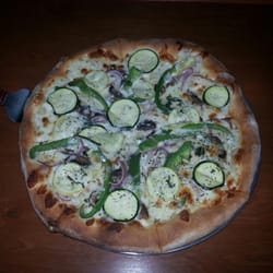 Ikey's Pizzeria - Pizza primavera. Alfredo sauce, zucchini, squash, peppers, mushrooms and grilled chicken.