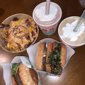 Next Level Burger - Classic Chzburger (left), Crispy Chik'n Burger (middle), Peanut Butted Cup and Strawberry milkshakes (small), Stylin' Fries - Special Style - Burgers Near Me - San Francisco, California