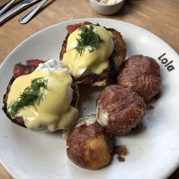 Lola - Eggs Benedict with salmon, best Benedict I've ever had, and those potatoes are amazing! - Greek Near Me - Seattle, Washington