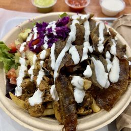 Salad bowl with half chicken shawarma, half lamb/beef, and all the standard toppings!