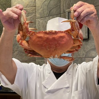 Sushi Iki - a chef holding up a crab - Japanese Near Me - Tarzana, California