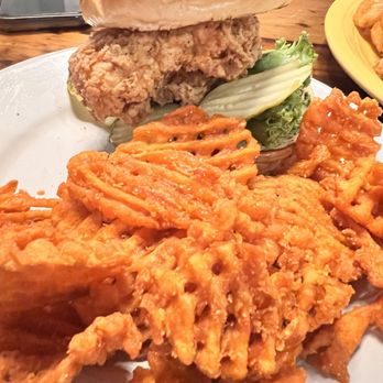 The Brown Barrel - Buffalo chicken sandwich with sweet potato fries - American Near Me - Frankfort, Kentucky The Brown Barrel - Buffalo chicken sandwich with sweet potato fries - American Near Me - Frankfort, Kentucky