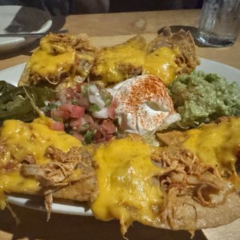 Bandito's Tex-Mex Cantina - Pulled chicken nachos small order consists of 6 very filling and again delicious! - Mexican Near Me - Dallas, Texas Bandito's Tex-Mex Cantina - Pulled chicken nachos small order consists of 6 very filling and again delicious! - Mexican Near Me - Dallas, Texas
