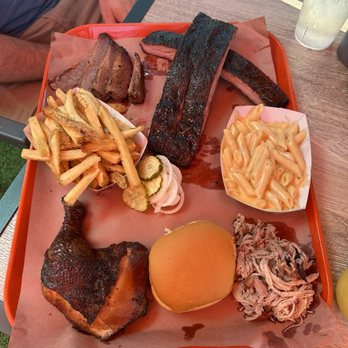 The Bearded Pig - The San Marco Platter with ribs, dark meat chicken, lean brisket, pulled pork, regular fries, mac and cheese, and a roll of - Barbeque Near Me - Jacksonville, Florida The Bearded Pig - The San Marco Platter with ribs, dark meat chicken, lean brisket, pulled pork, regular fries, mac and cheese, and a roll of - Barbeque Near Me - Jacksonville, Florida