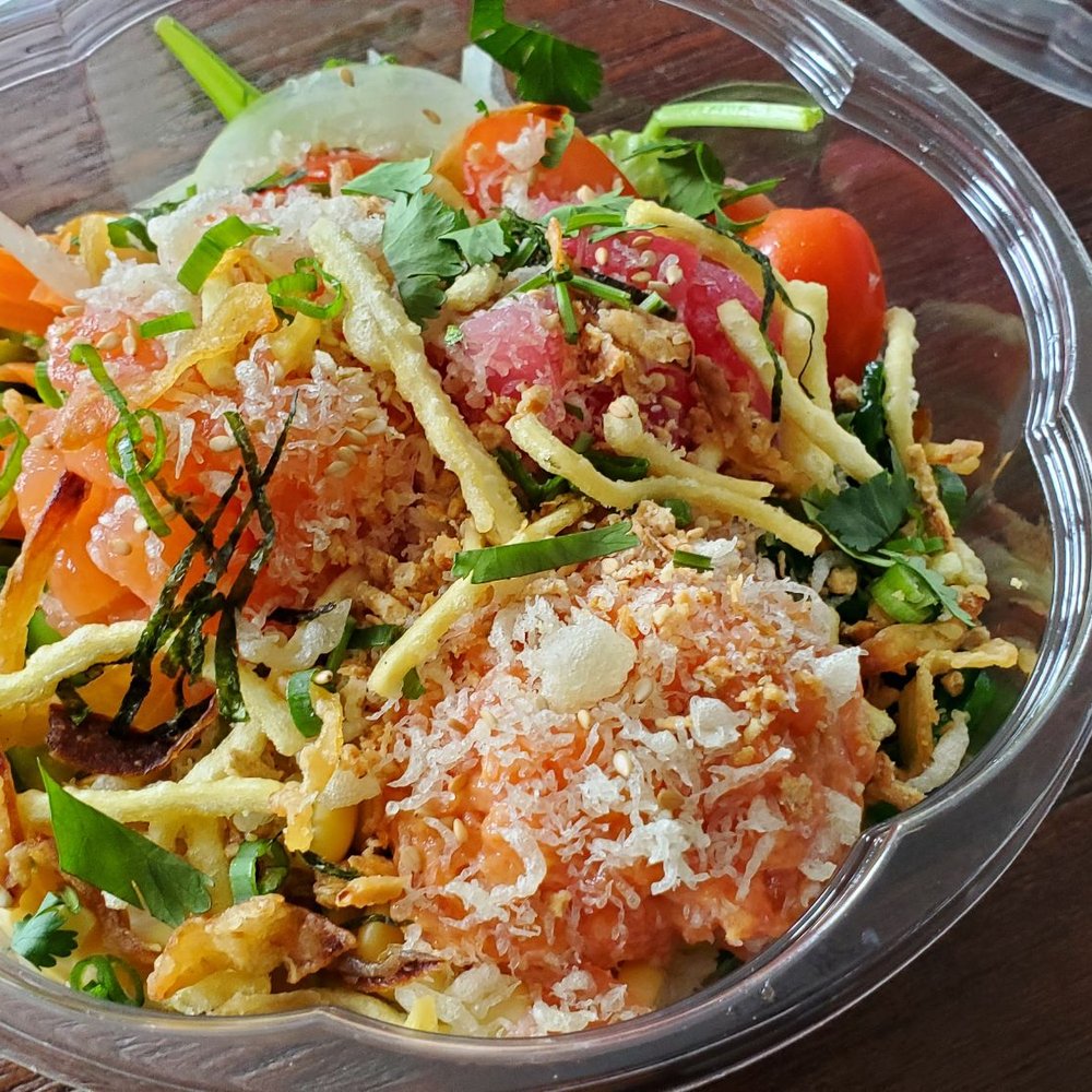 a salad in a plastic bowl a salad in a plastic bowl