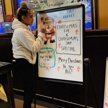 Asian Star Buffet - a woman writing on a board - Buffets Near Me - Dallas, Texas Asian Star Buffet - a woman writing on a board - Buffets Near Me - Dallas, Texas