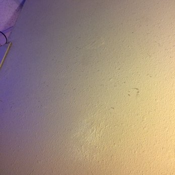 Sun Rayz Tanning Center - Walls in the spray tan and stand up booth. Dust clinging to them. - Spray Tanning Near Me - Pensacola, Florida Sun Rayz Tanning Center - Walls in the spray tan and stand up booth. Dust clinging to them. - Spray Tanning Near Me - Pensacola, Florida