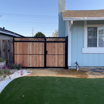 Ingenious General Construction - Iron and redwood gate - General Contractors Near Me - Walnut Creek, California