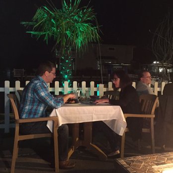 Anchor Down Dockside - fellow Yelp friend Frank T and his lovely wife enjoying a moon lit 73 degree early November dinner - Seafood Near Me - Seaford, New York
