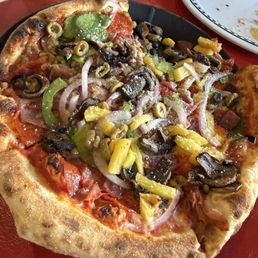 The mama Mia with pineapple on half and substitute green olives instead of black olives !!!