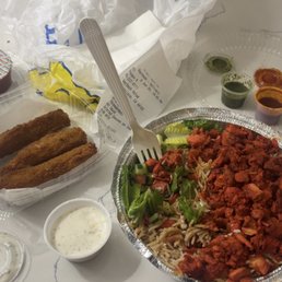 Mozzarella sticks and chicken over rice Mozzarella sticks and chicken over rice