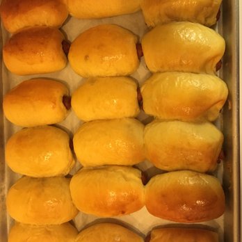 Sunny Donut - a tray of freshly baked buns - Donuts Near Me - Forney, Texas Sunny Donut - a tray of freshly baked buns - Donuts Near Me - Forney, Texas